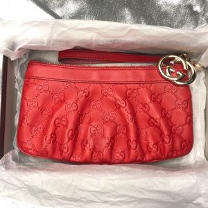 Gucci red Leather Wristlet (item: 212203 001998)